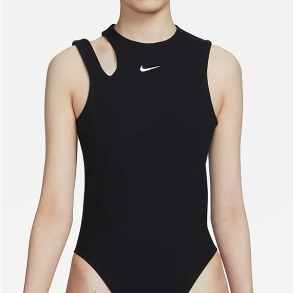 Nike Tops - Nike Black Sleeveless Bodysuit NWT
Size M. Cute shoulder cutout detail. Stretchy